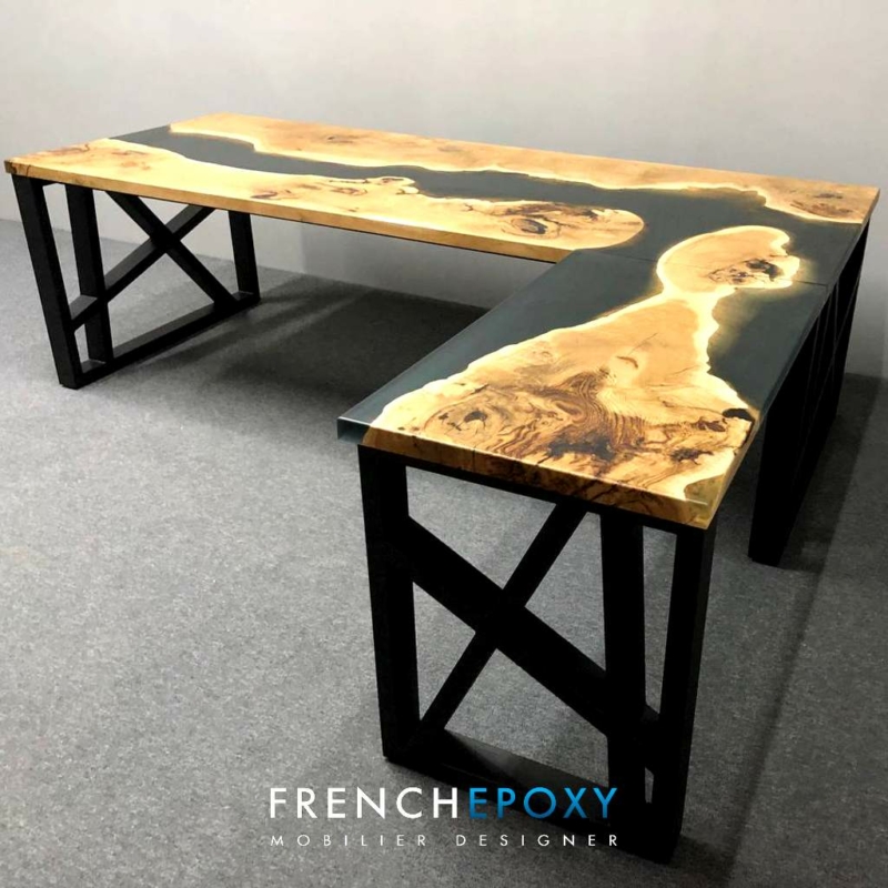 A Table With An Original Design In Transparent Black Resin